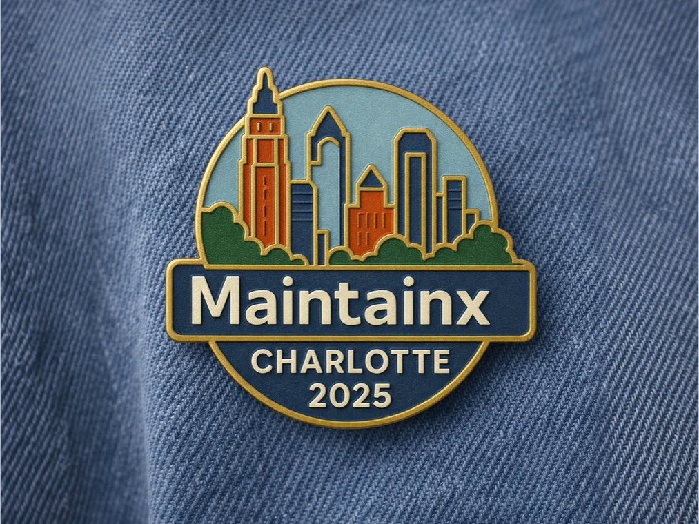 MaintainX Charlotte 2025 enamel pin on denim